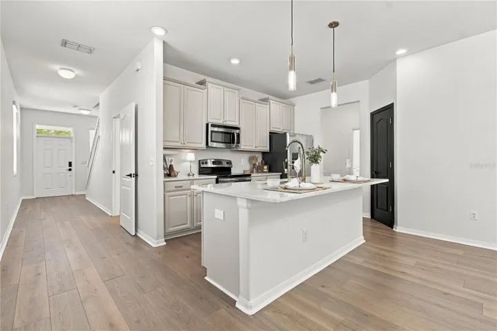 Kitchen to Hallway and Staircase