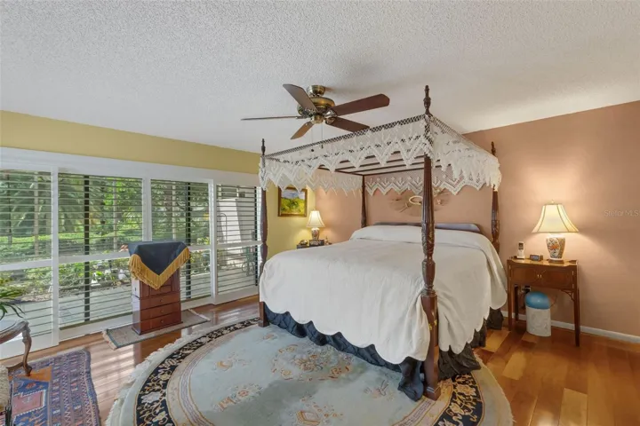 Down a short hallway is the oversized primary suite . . .