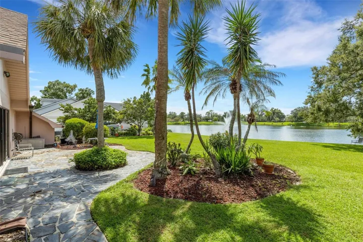 Stepping outside you'll find the flagstone walkway become and open patio.