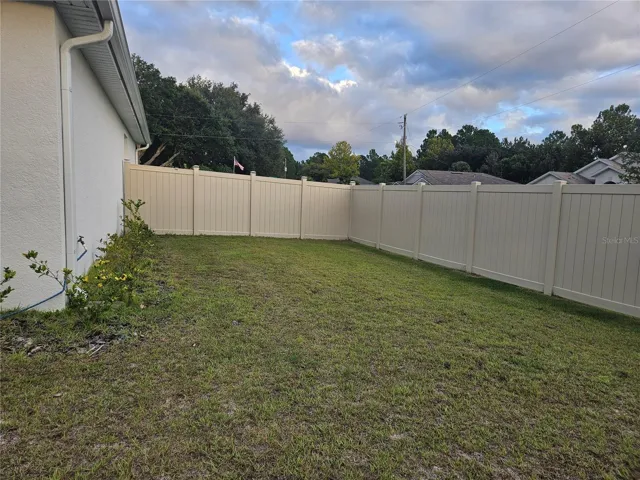side fenced yard