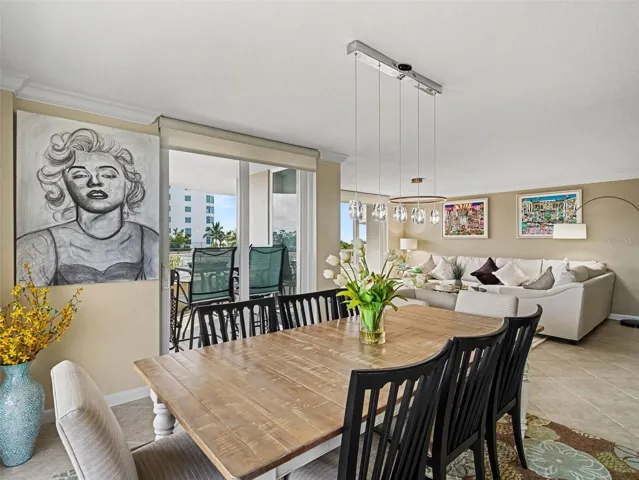 Dining opens to Living room and Balcony