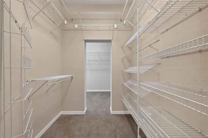 Primary Bedroom Second Walk-In Closet with Extended Rear Walk-In Closet
