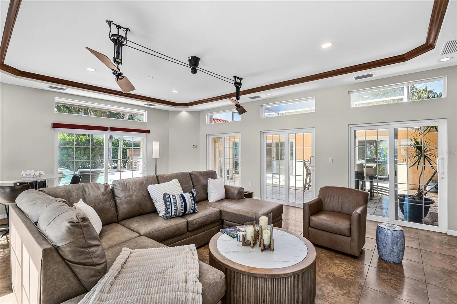 The approximately 424 square foot flex room offers generous space for media, games, fitness, lounging or other flexible uses.