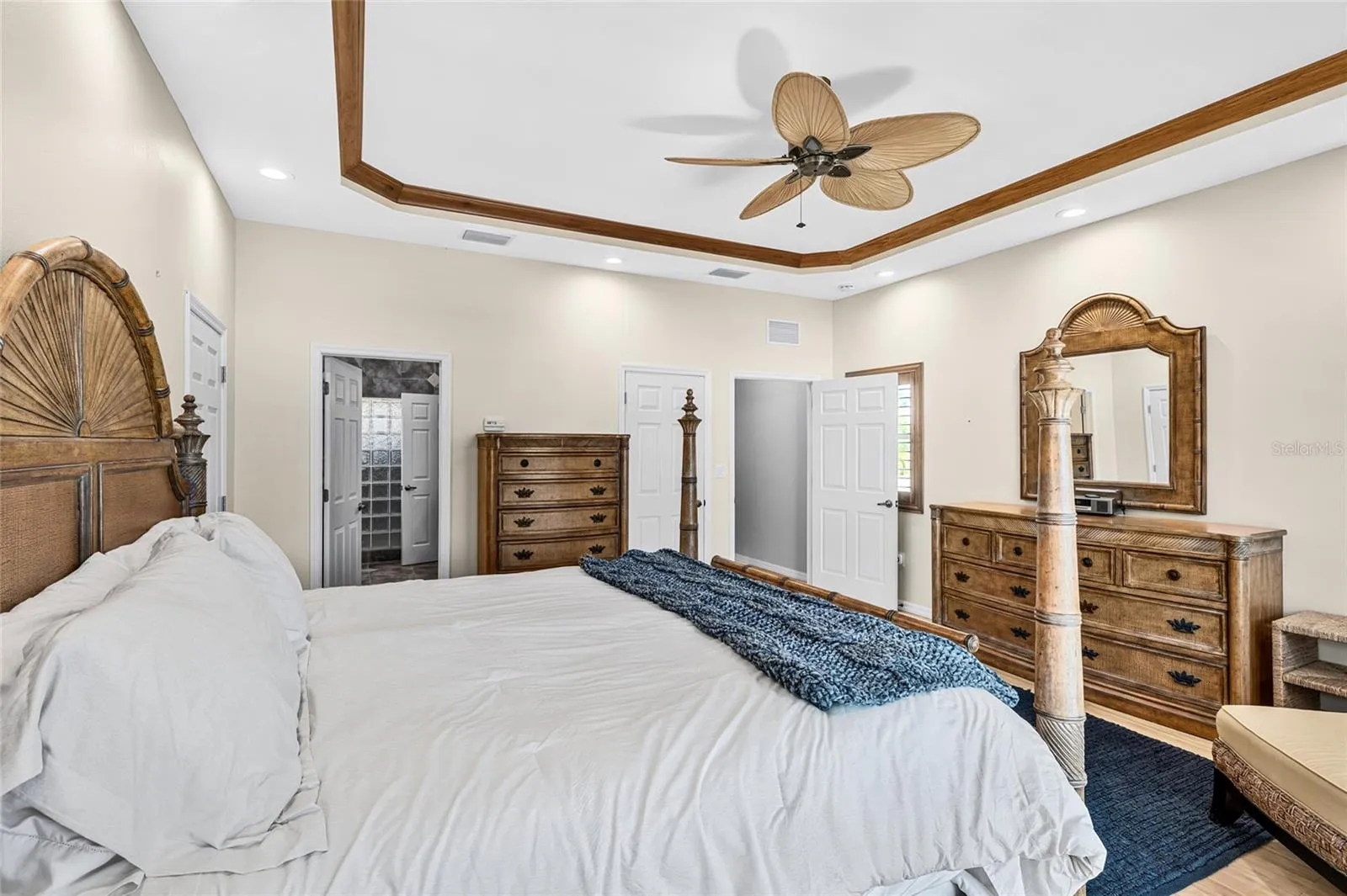 Another view of the second floor primary retreat highlights its spacious layout and peaceful private setting.