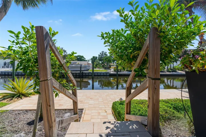 Waterfront Terrace Twilight, highlighting the connection to the water and Siesta Key lifestyle.