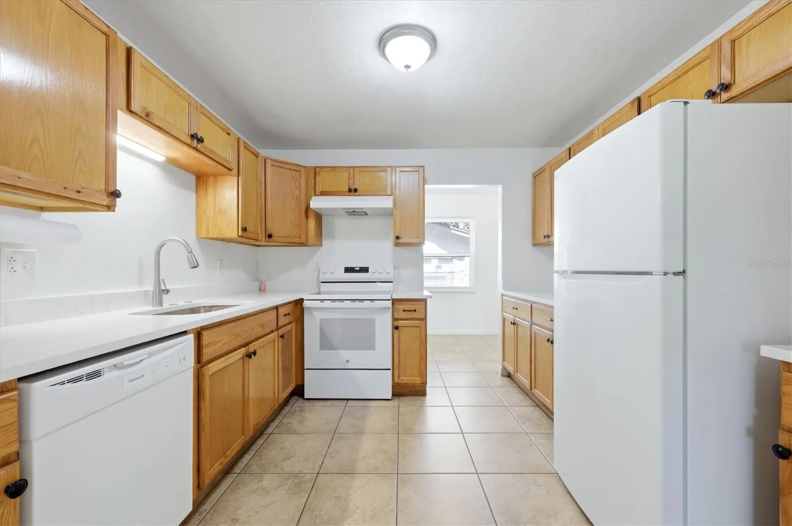 New dishwasher, range, sink and faucet.