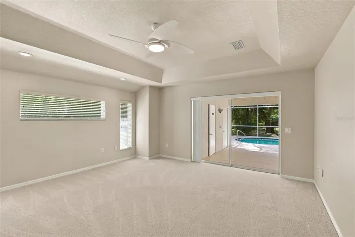 Primary Bedroom with Pocket Slider to Pool and Lanai