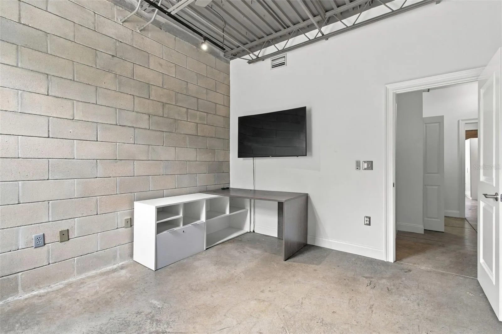 Desk in guest room can be removed or remain in the space.