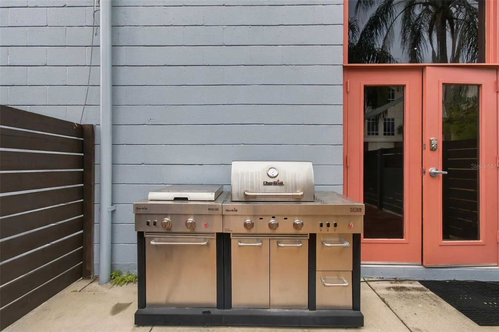Outdoor grill remains on property, perfect for grilling and entertaining.
