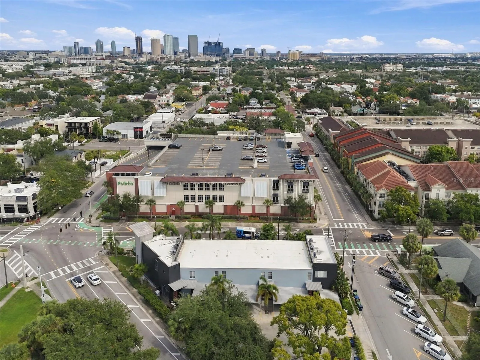Publix supermarket is conveniently located across the street.