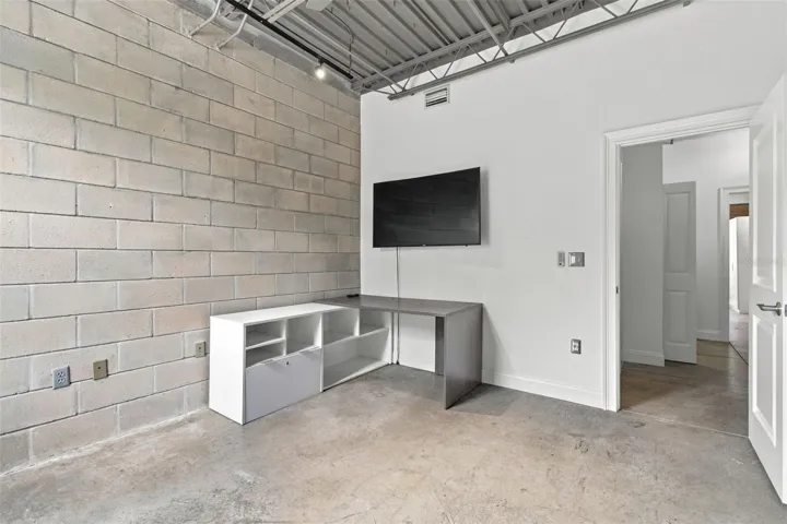 Desk in guest room can be removed or remain in the space.
