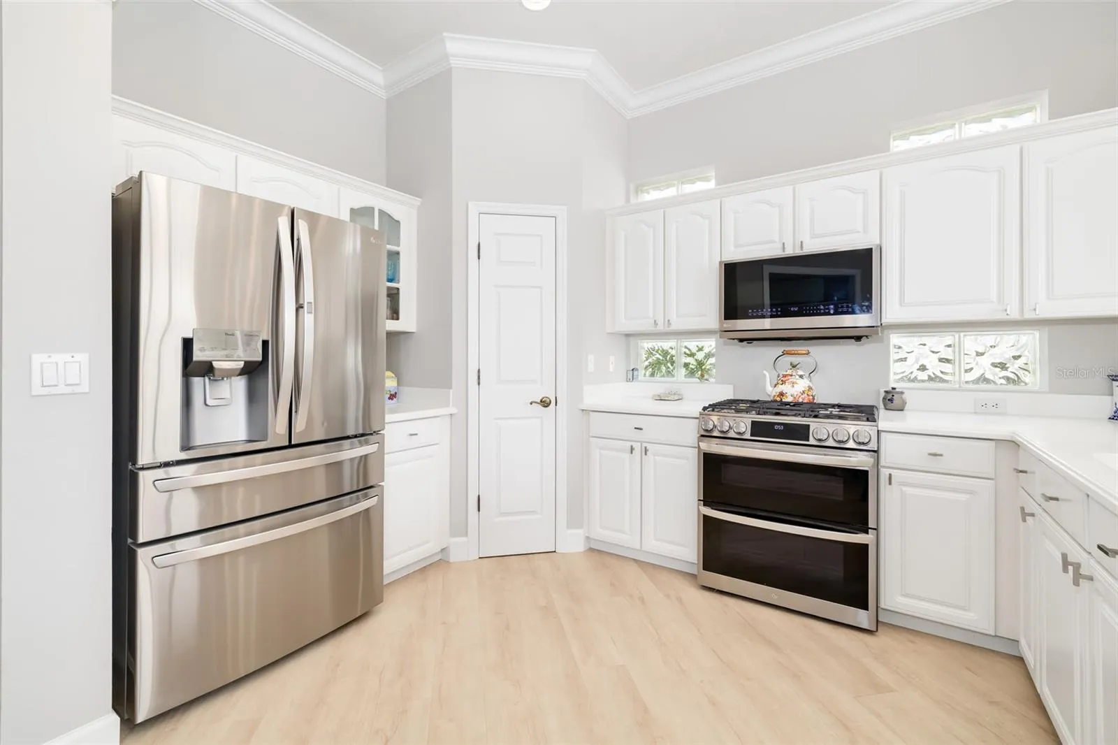 Another view showing the door to the oversized Pantry.