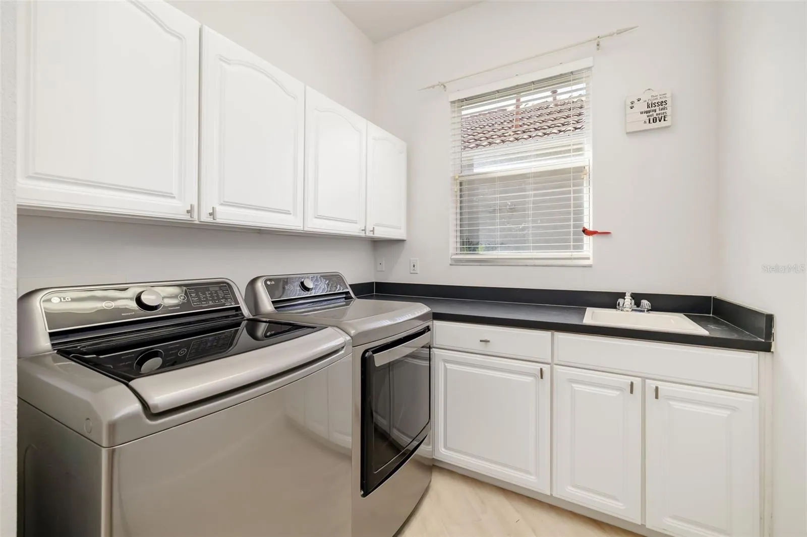 Fantastic roomy laundry room. Usually only seen in much larger homes. W/D do not convey.