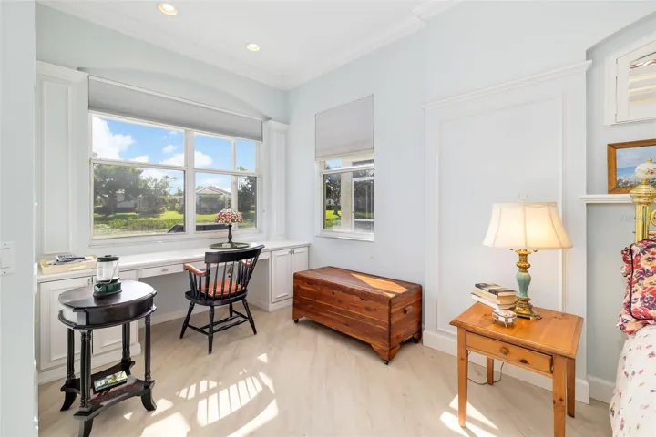 Built in desk and storage under the window.