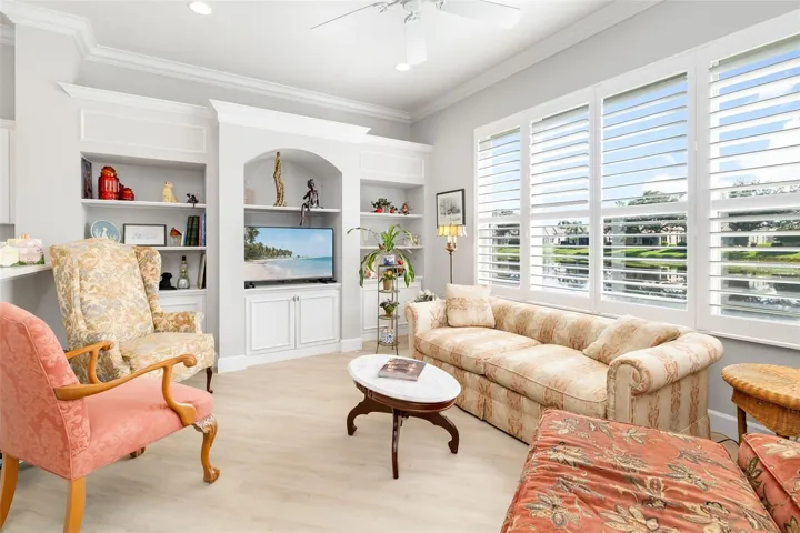 Stunning custom built in Cabinetry. Plantation Shutters. Please note the Luxurious LPV Flooring that is installed throught the home other than bathrooms where you will find tile.