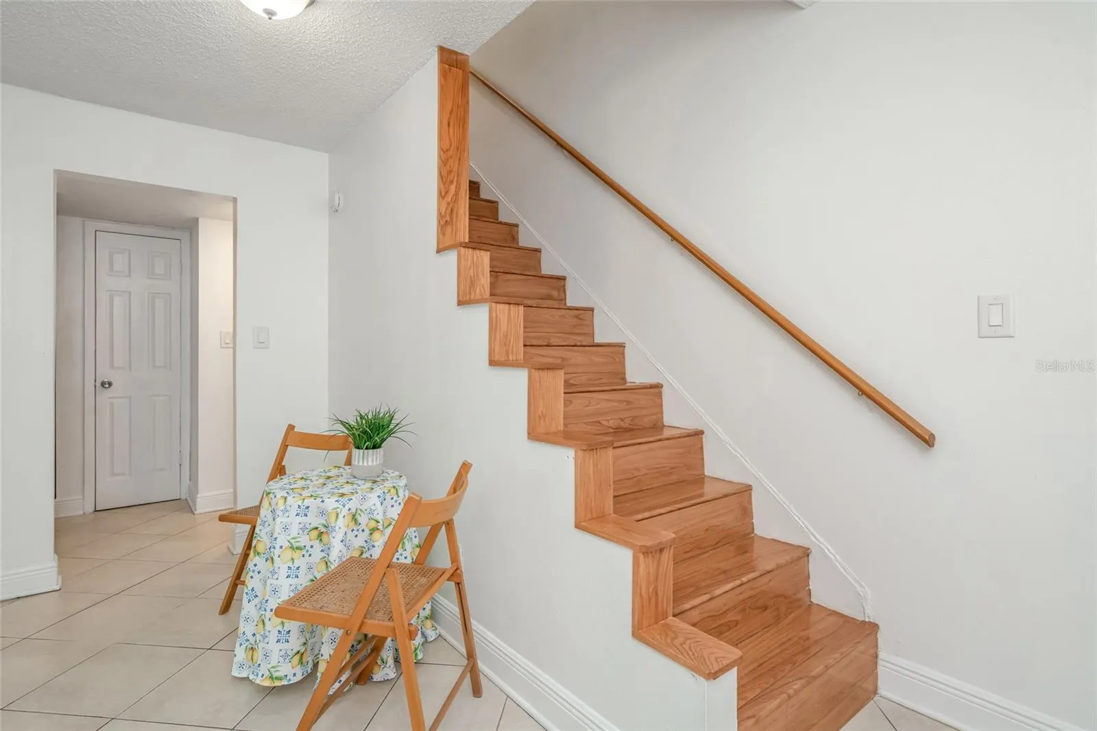 501 E Bay Dr 702, dining area and stairs