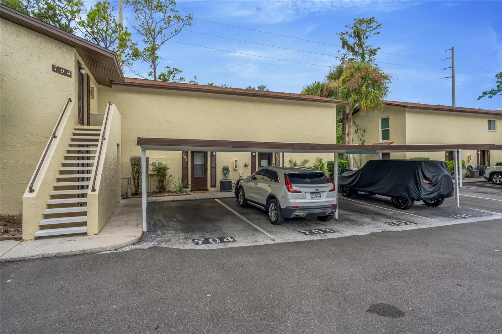 501 E Bay Dr 702, covered parking in front of townhome