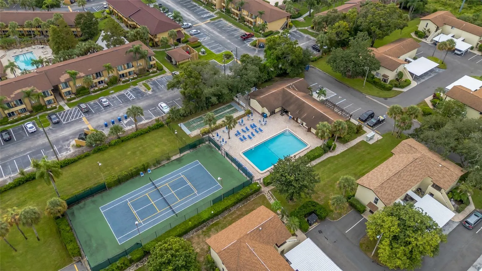 501 E Bay Dr 702, aerial view of Magnolia Park pool and tennis courts