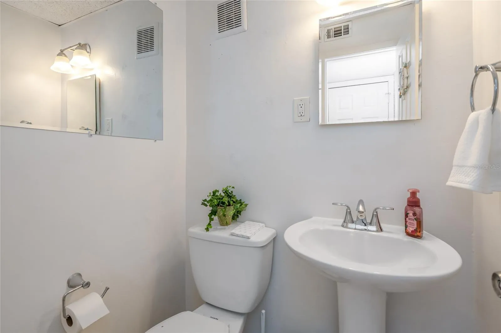 501 E Bay Dr 702, half bath off front entry