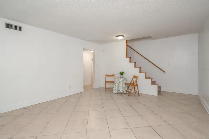 501 E Bay Dr 702 Living - Dining area, view toward front entry hall and stairs