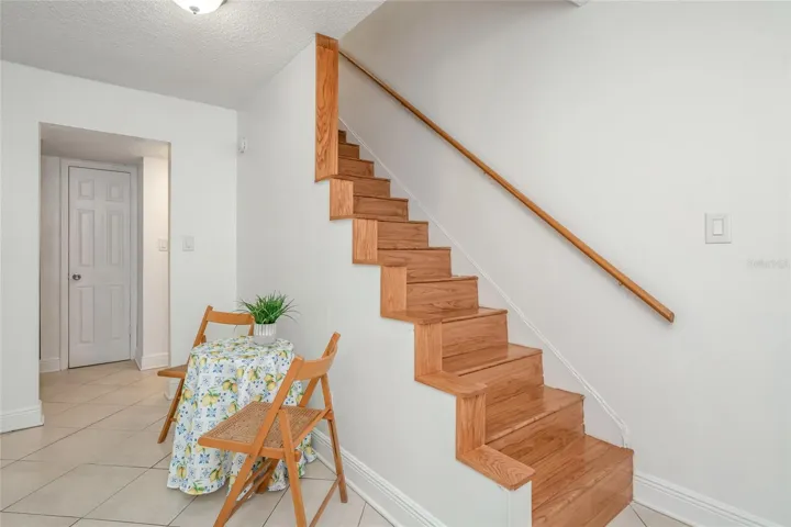 501 E Bay Dr 702, dining area and stairs