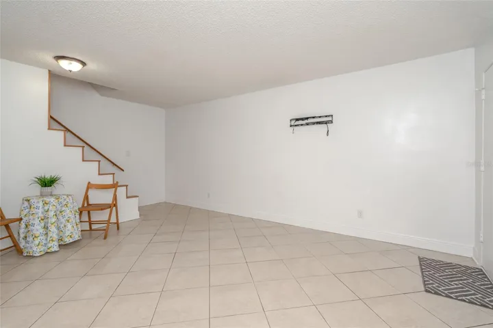 501 E Bay Dr 702, living - dining area, view toward stairway