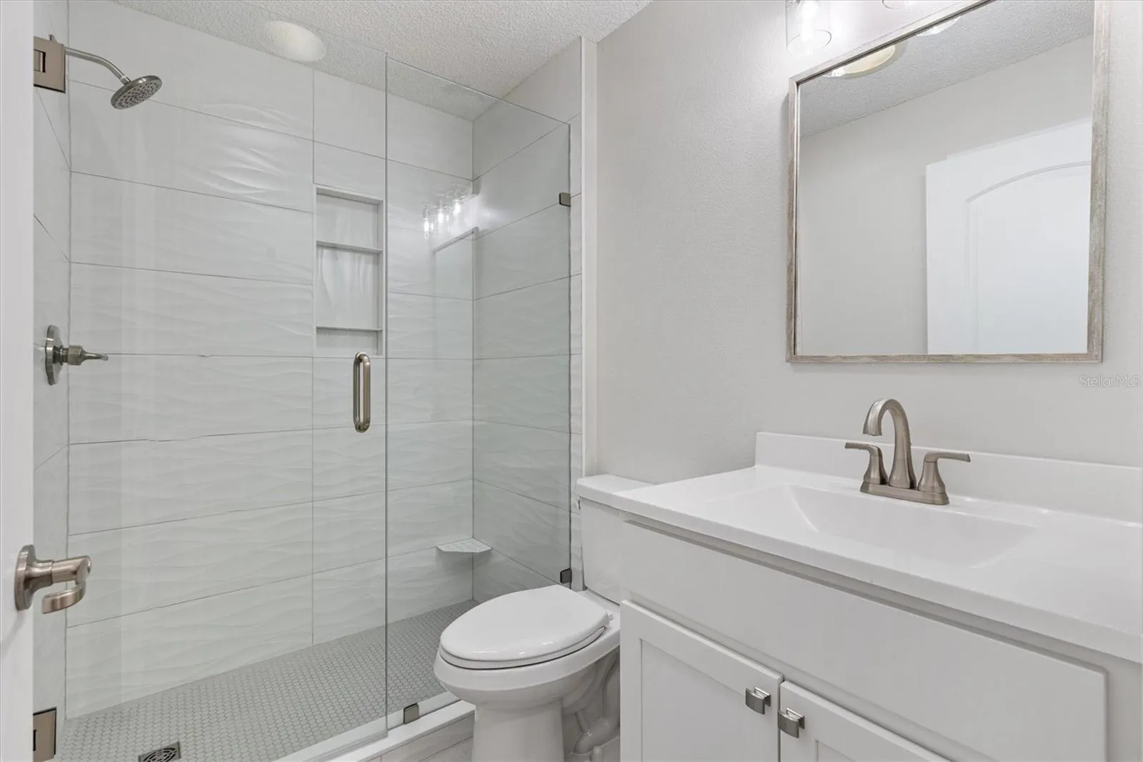 Guest Bath with Glass Enclosed Shower