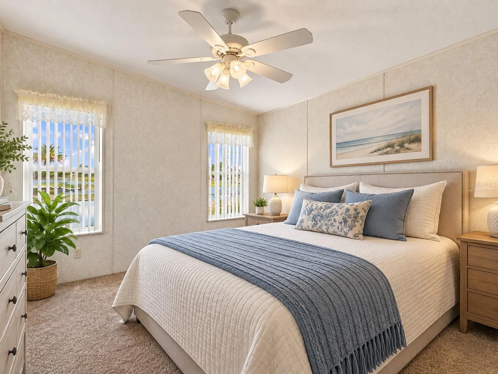 Virtually staged for visualization purposes -Primary Bedroom overlooking the water!