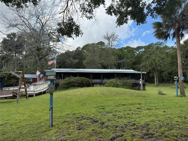 Front of the home.  The screen porch gives privacy
