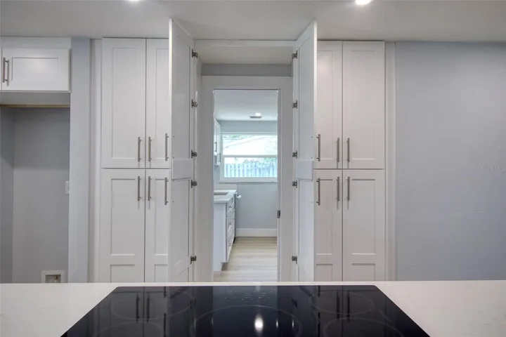 Hidden entrance to in-law suite from kitchen