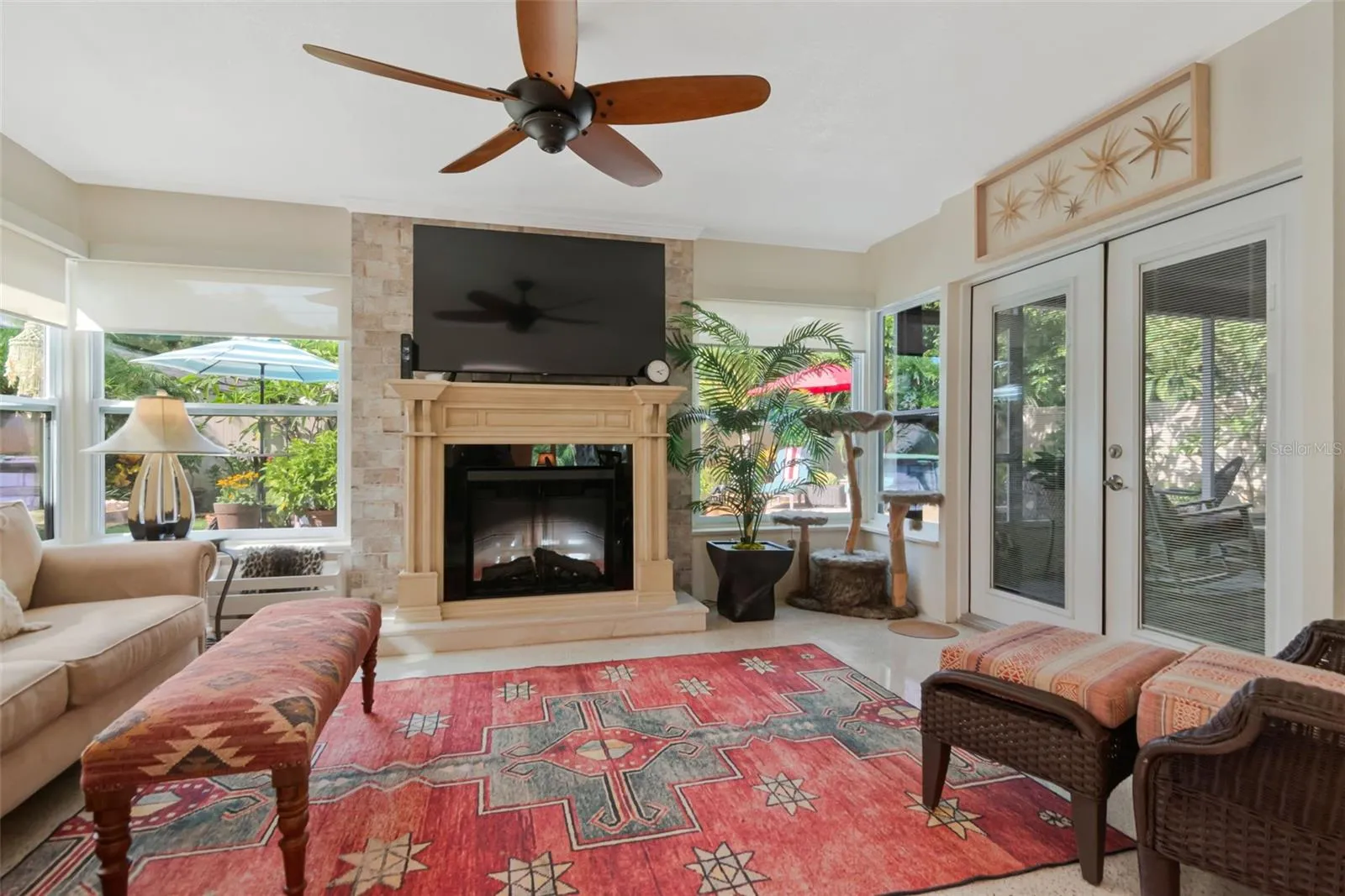Family Room with LOTS of Lighting and views of the gorgeous backyard!