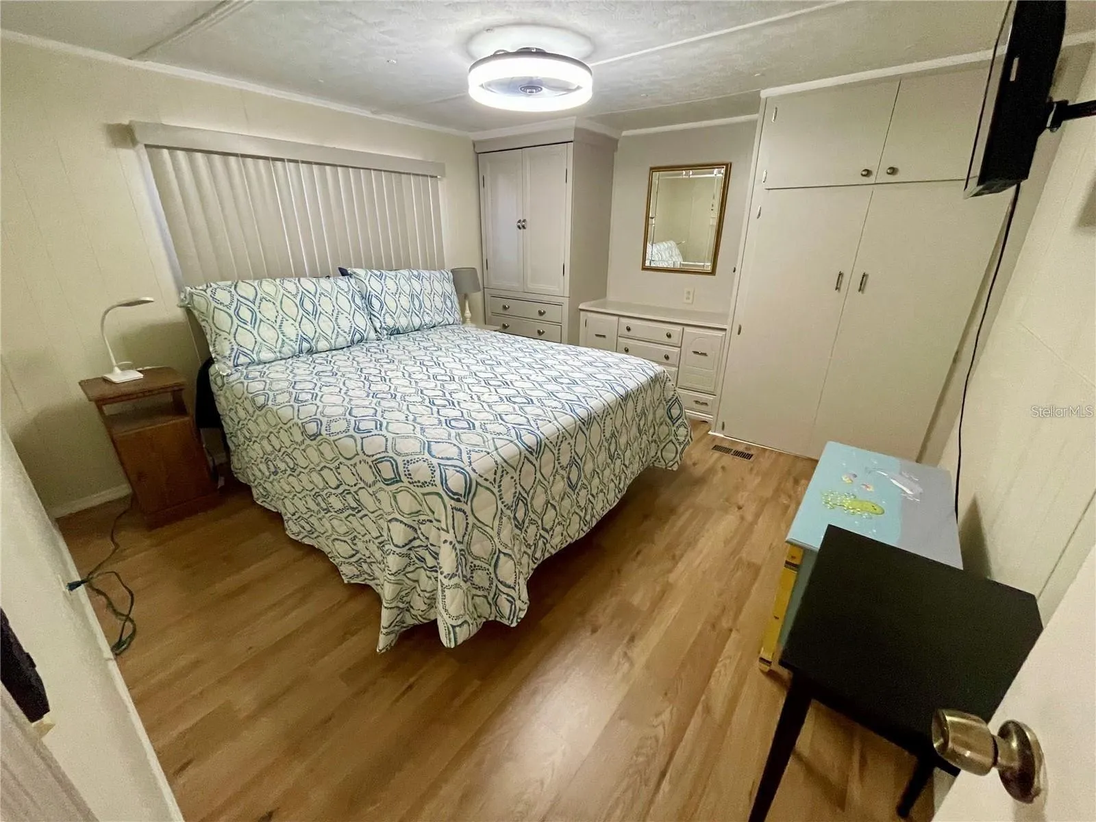 This is the larger bedroom, at the back of the home. Right next to the bathroom.