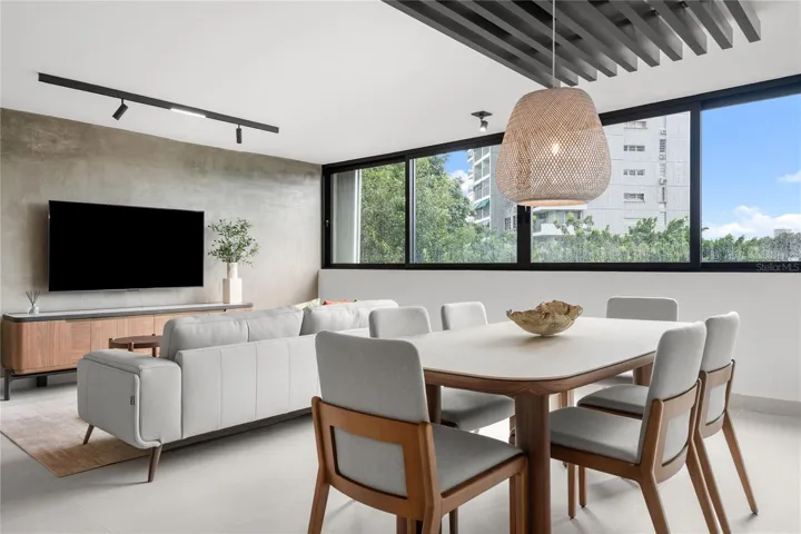 Mansiones de Garden Hills 3J | Dining and Living Areas