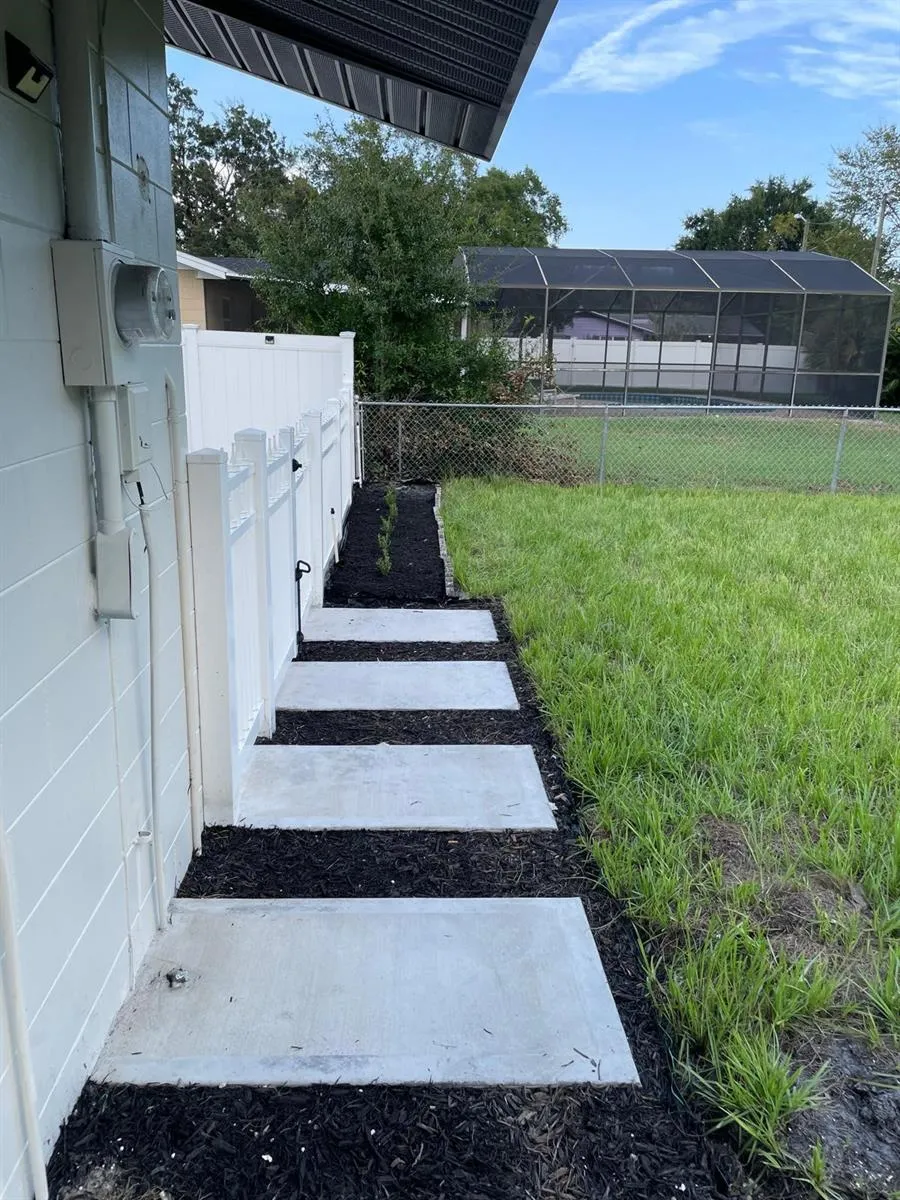 Driveway to Backyard/Rear of House Walkway.