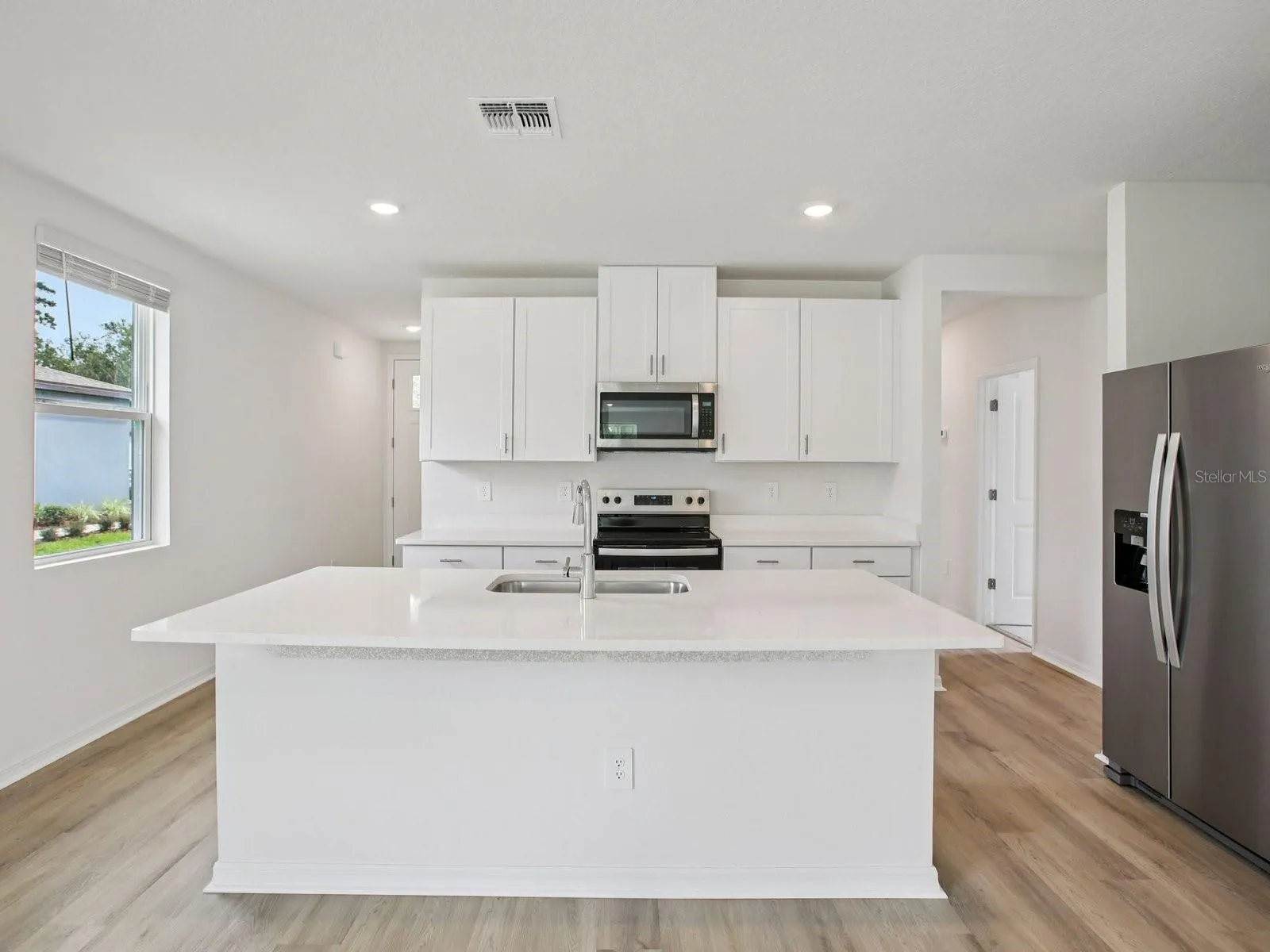 Photo is not of the actual home but of a builder home with same floorplan with similar interior finishes.