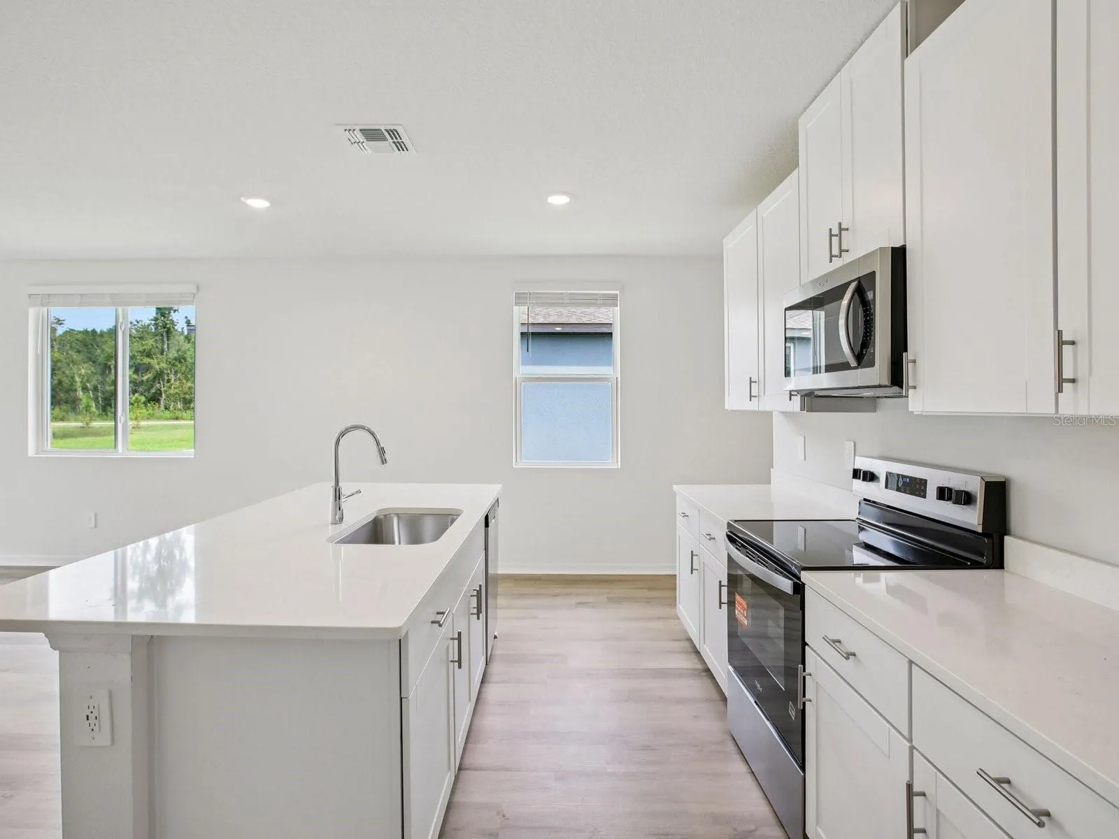 Photo is not of the actual home but of a builder home with same floorplan with similar interior finishes.