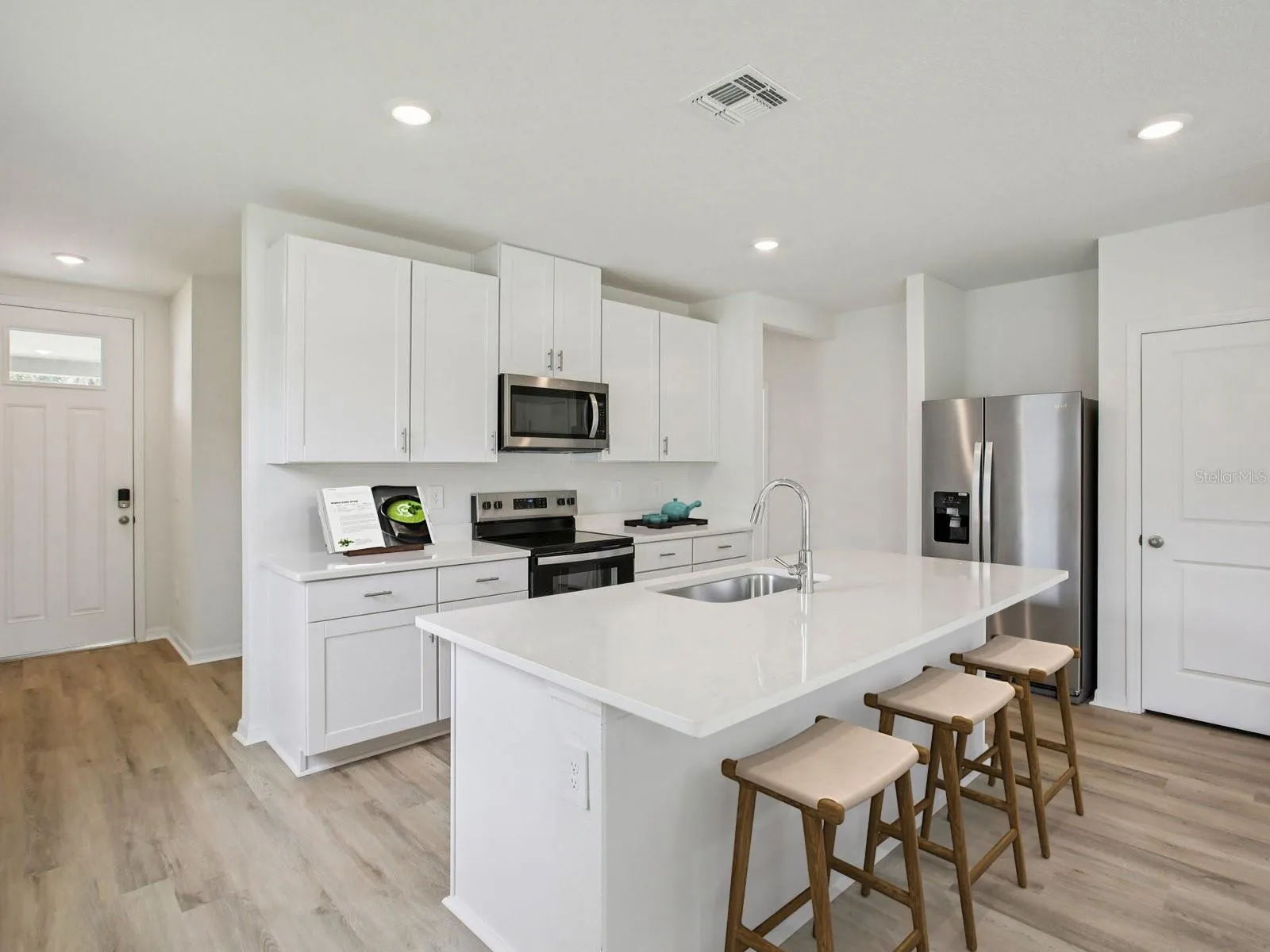 Photo is not of the actual home but of a builder home with same floorplan with similar interior finishes.