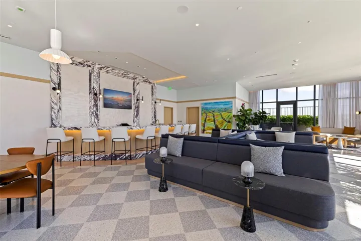 An airy gathering space where indoor comfort flows naturally toward the terrace.