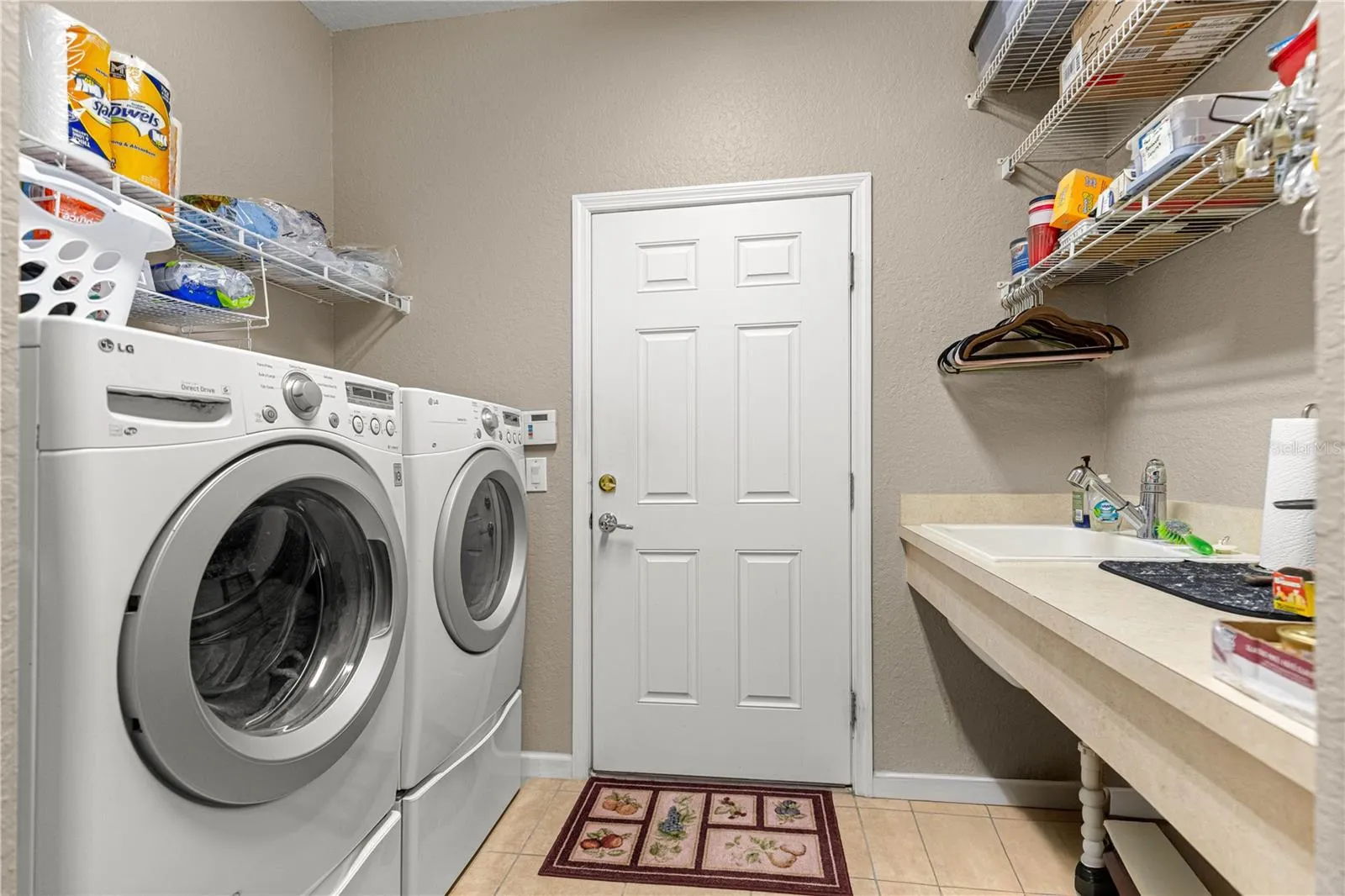 Laundry w/sink and Shelves