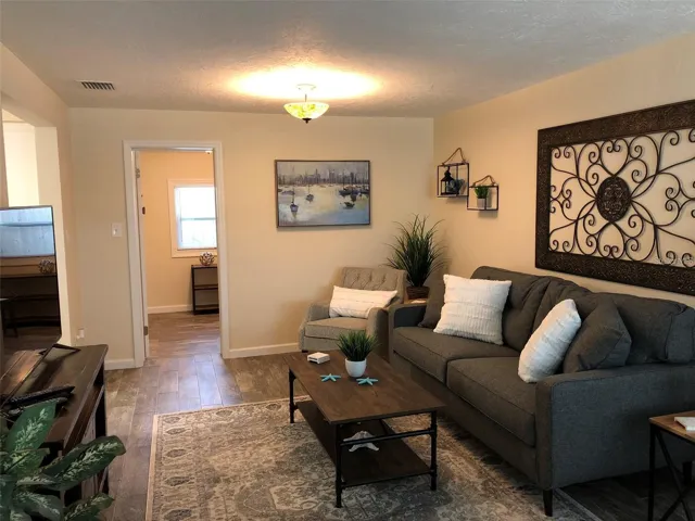 Living room shown furnished