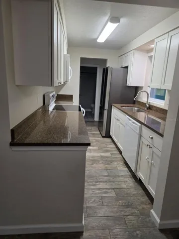 Galley kitchen with all new appliances