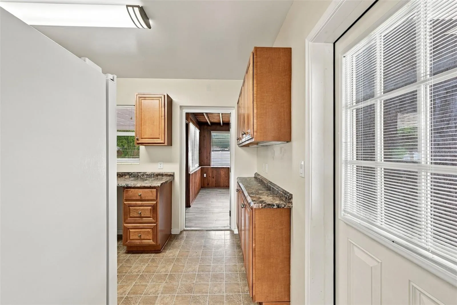 Kitchen Bar Area with Bonus Room Beyond