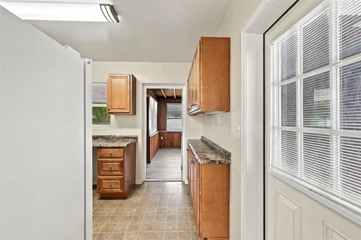 Kitchen Bar Area with Bonus Room Beyond