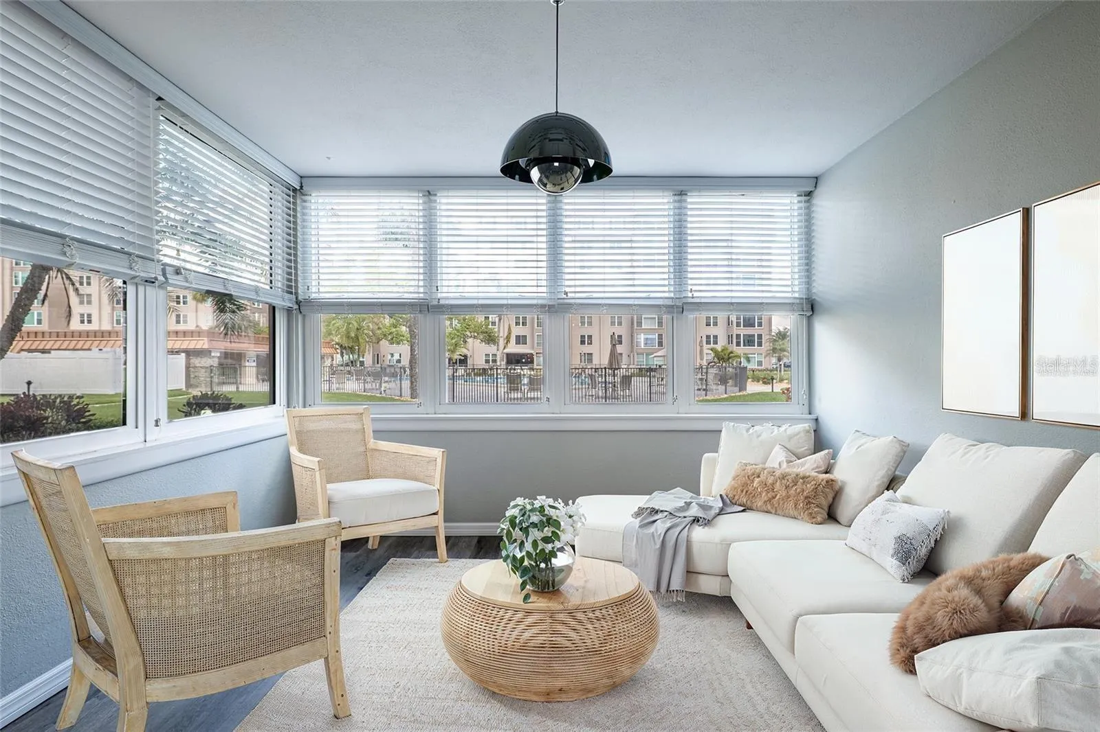 Beautiful sun room overlooking the pool and offering fantastic sunset views