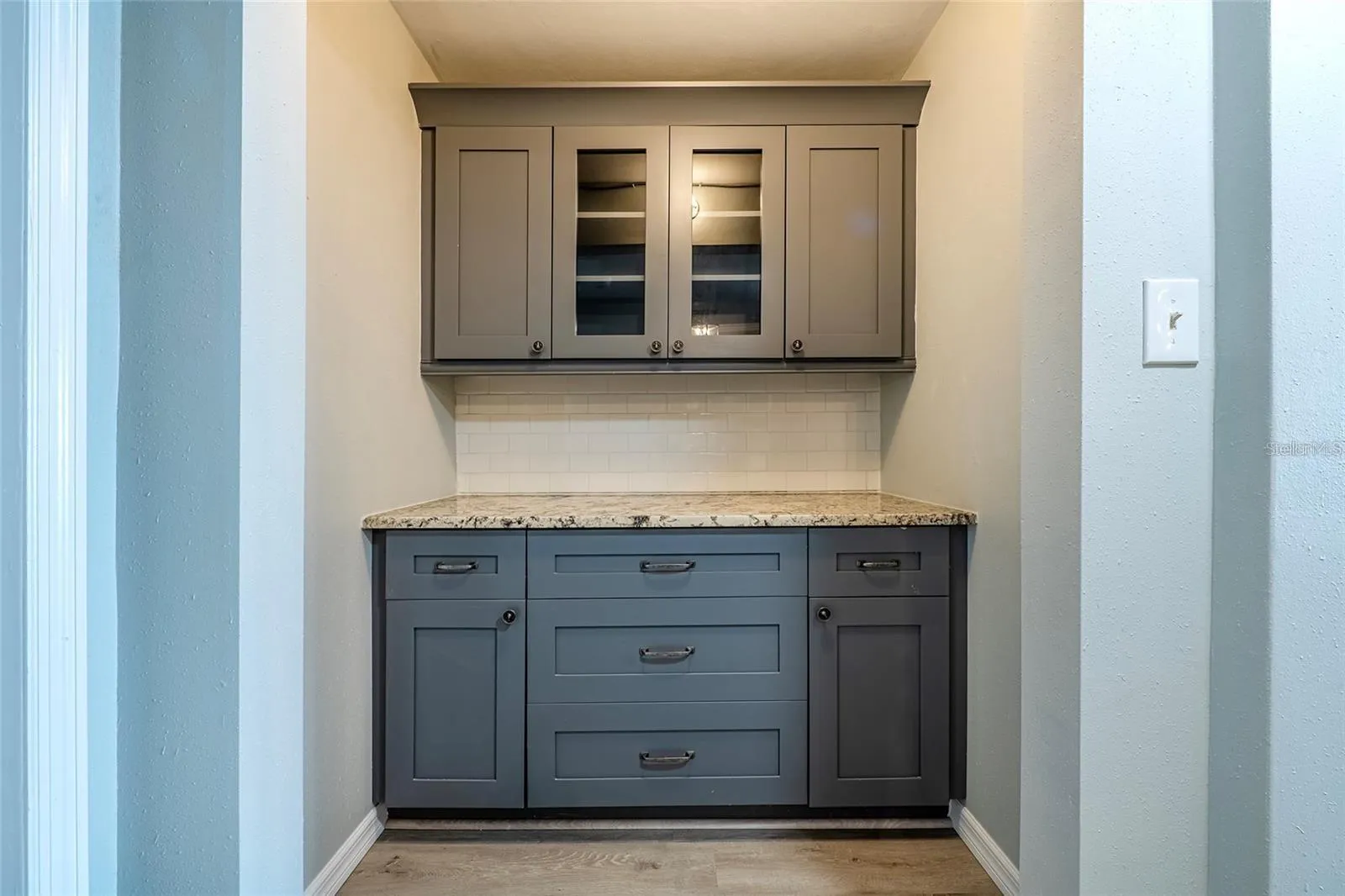 Built in coffee bar/wine bar/pantry next to kitchen