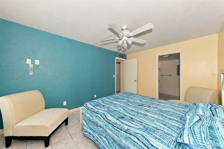 large primary suite with en suite bathroom and laundry
