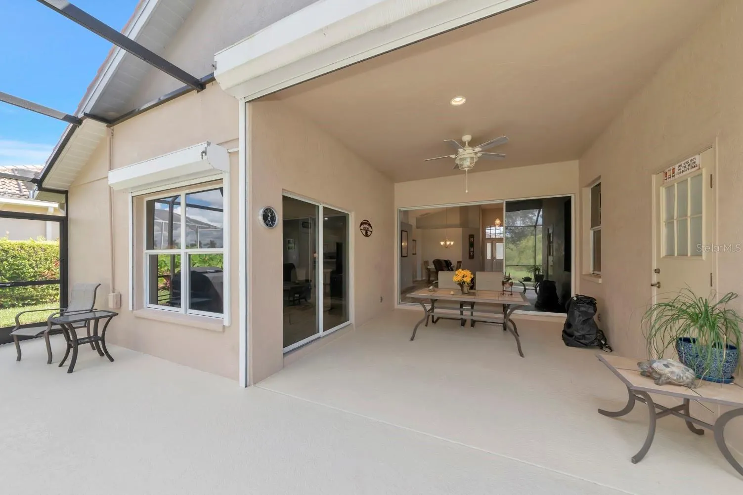 Roll down storm shutters on deep covered lanai.