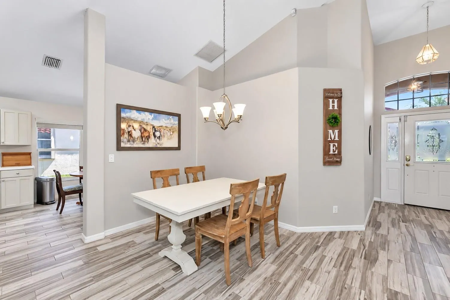 Plank tile flooring living areas and bedrooms.