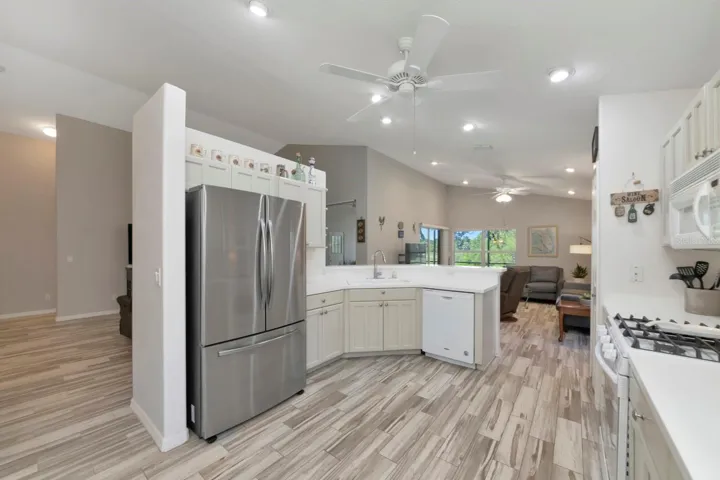 Shaker style cabinets. Replumbed w/PEX 2017.