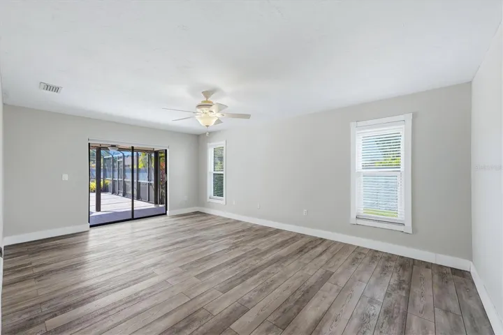 PRIMARY BEDROOM FACING POOL